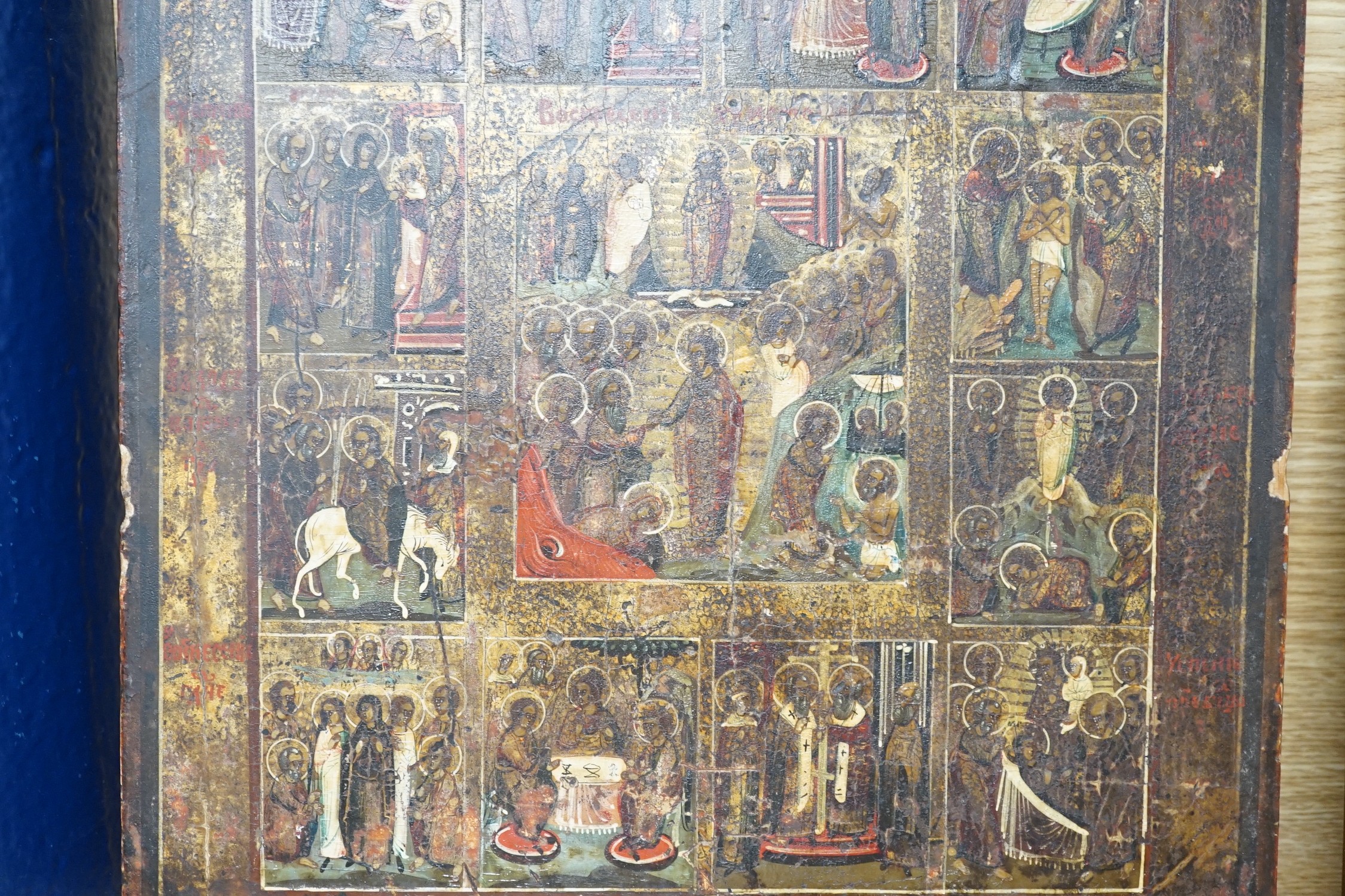 19th century Eastern European School, tempera on wooden panel, Icon with scenes from the Life of Christ, 35 x 30cm